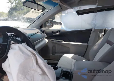 2014 Toyota Camry Le z USA, uszkodzony, nr VIN 4T4BF1FK9ER417320